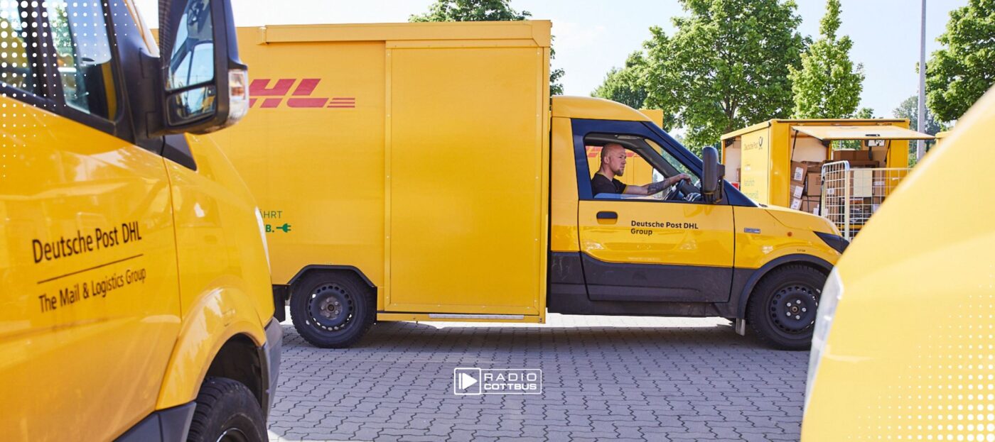 Ein gelbes DHL Auto aus Symbolbild